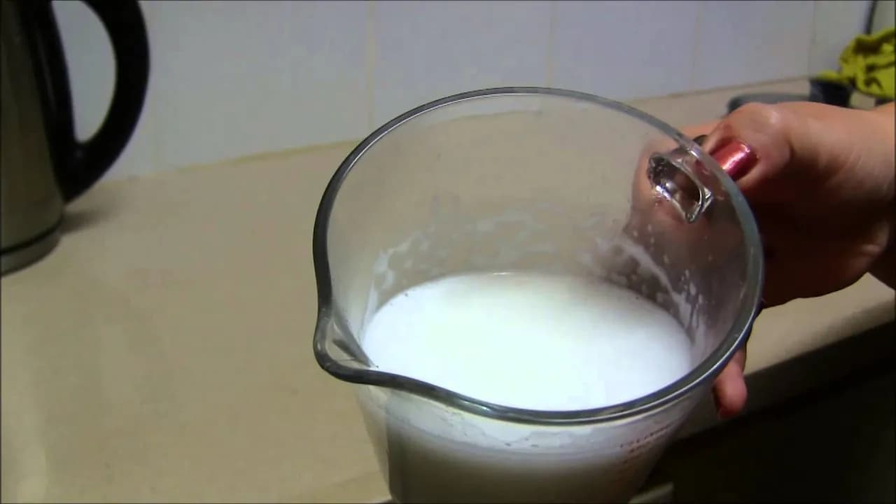 Homemade Coconut Milk and Coconut Flour by FoolyLiving, a frame from the YouTube video