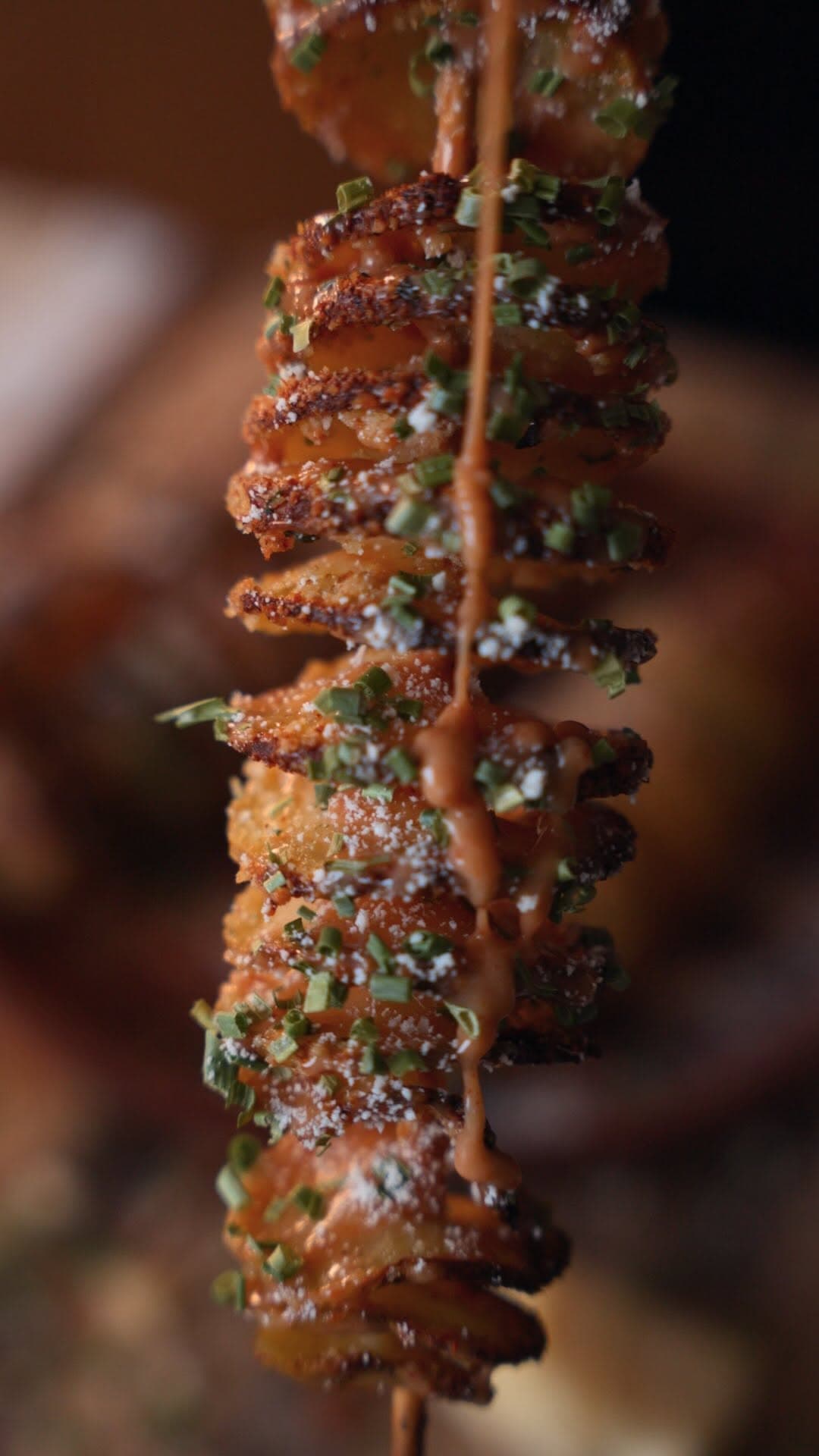 Delicious Grilled Potatoes with Crispy Topping and Tangy Sauce