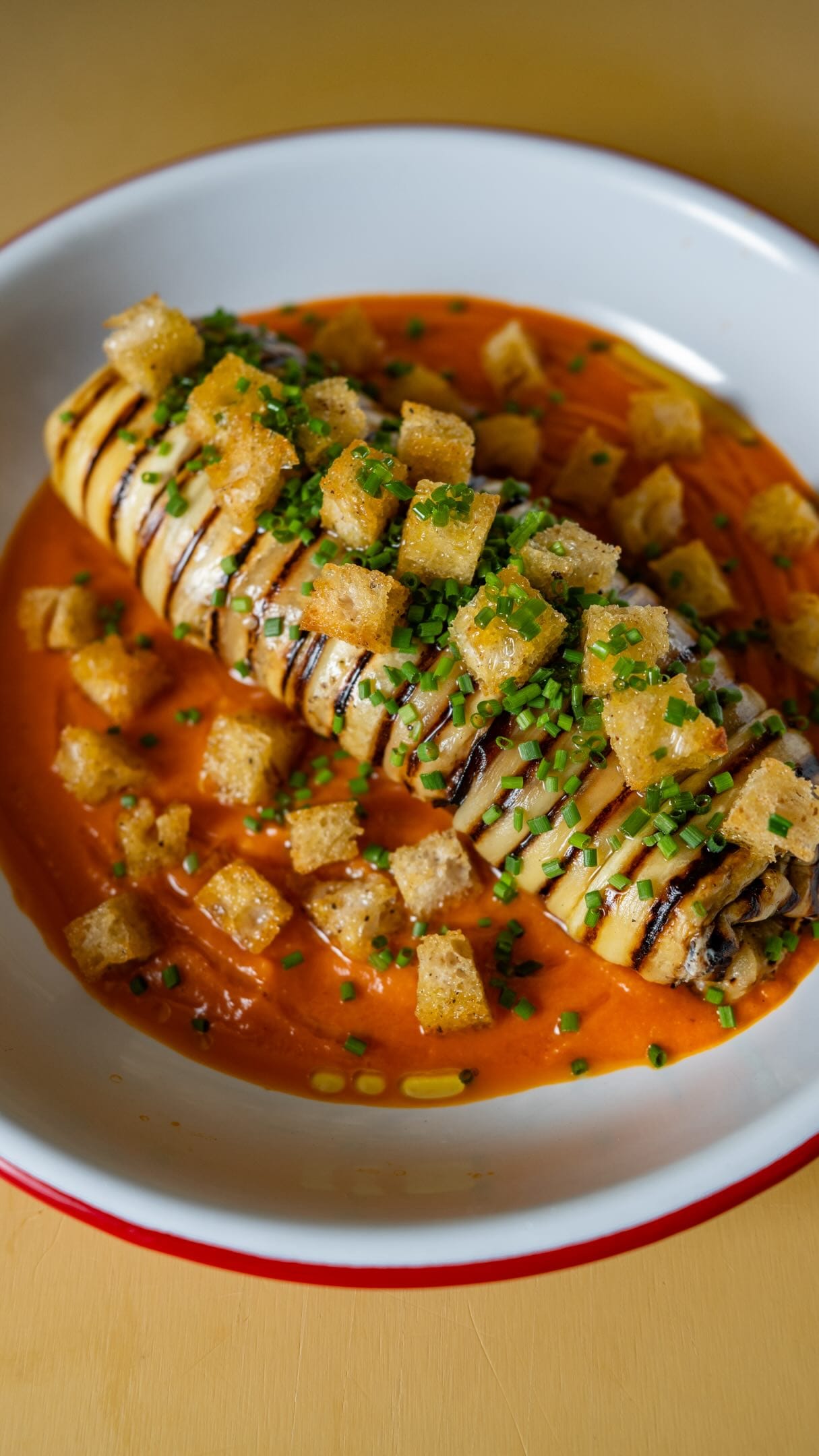 Stuffed Aubergine Parcel with Confit Garlic, Parmesan, Lemon Whipped Ricotta and Roasted Tomato‑Red Pepper Sauce