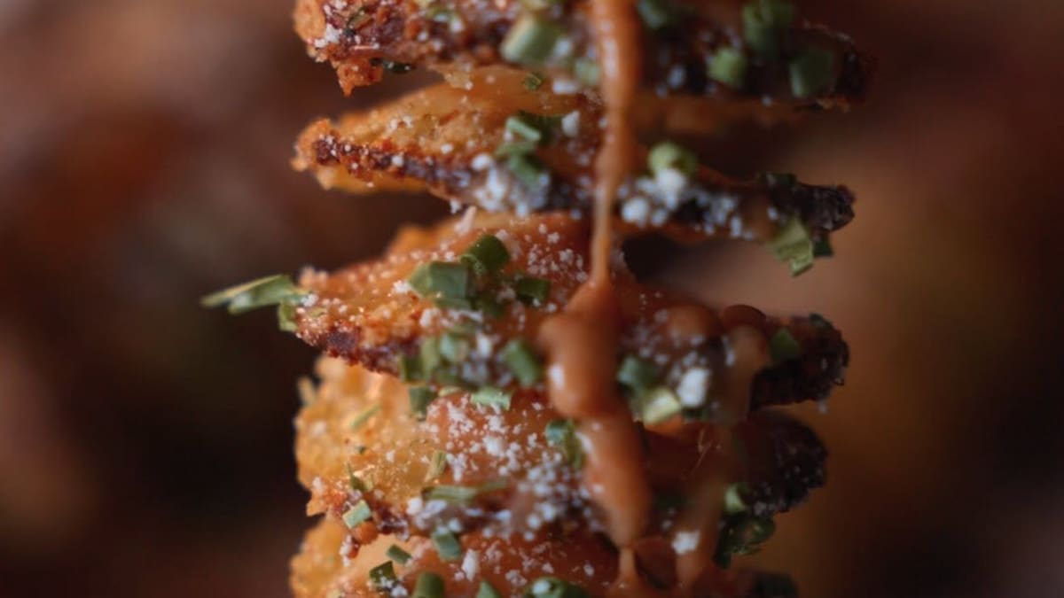 Delicious Grilled Potatoes with Crispy Topping and Tangy Sauce