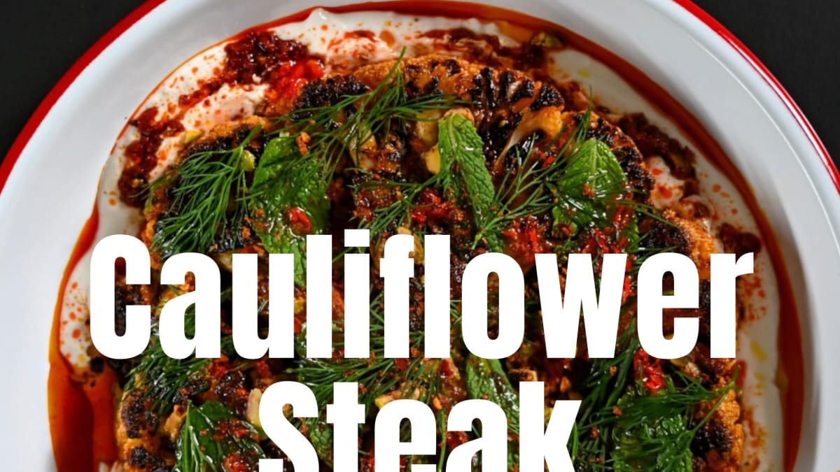Cauliflower Steak with Harissa Yogurt, Scotch Bonnet Honey, Fresh Herbs and Pistachios