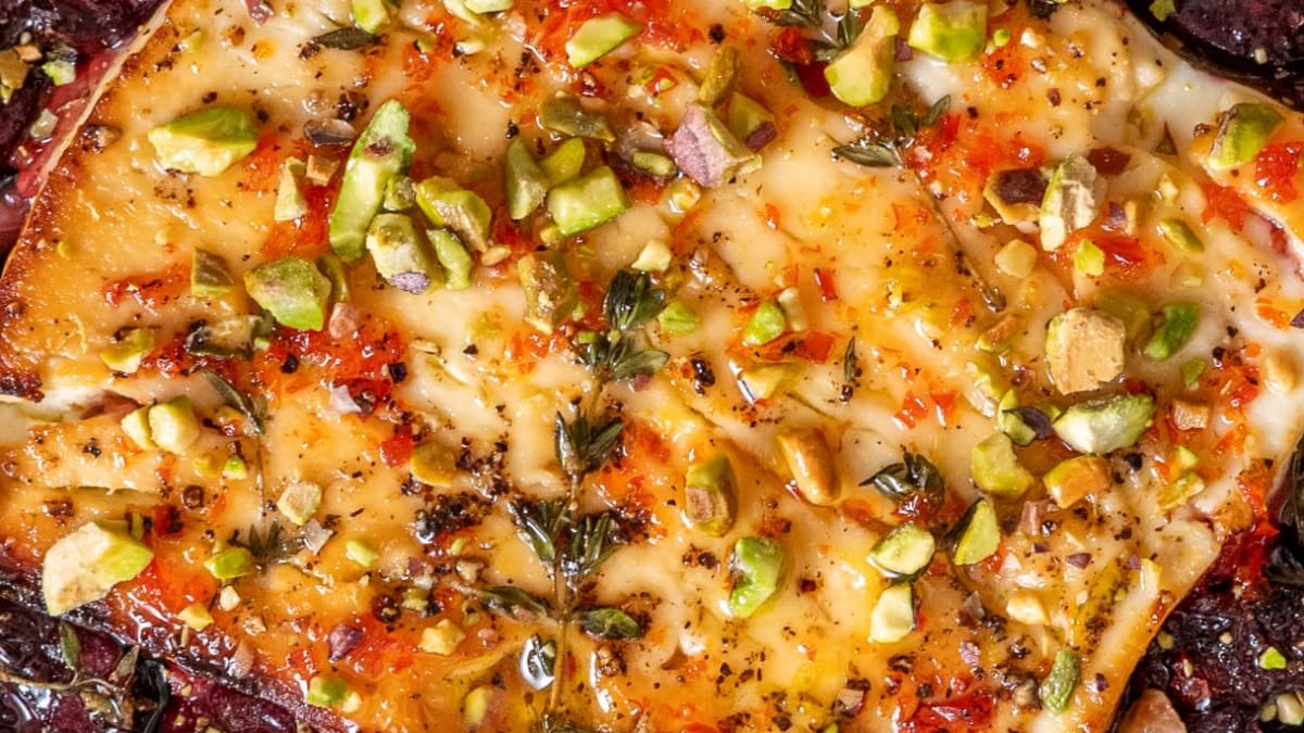 Baked Feta with Jammy Cherries, Hot Honey, Pistachios and Crispy Garlic