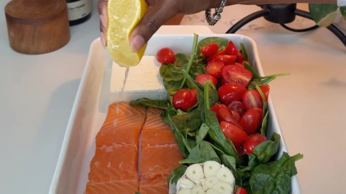 Baked Salmon with Spinach, Cherry Tomatoes, and Pesto