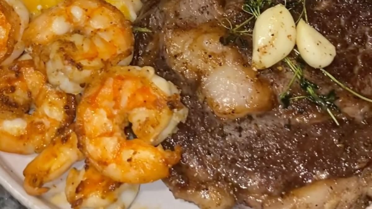 Bone‑in Ribeye Steak with Cajun Shrimp, Garlic‑Butter Mash, and Herb Asparagus